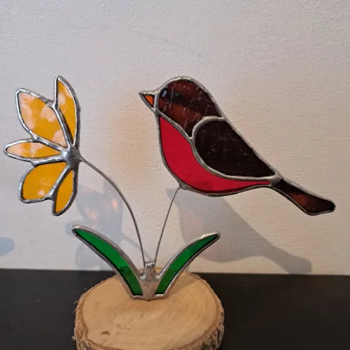 Vogeltje met bloem